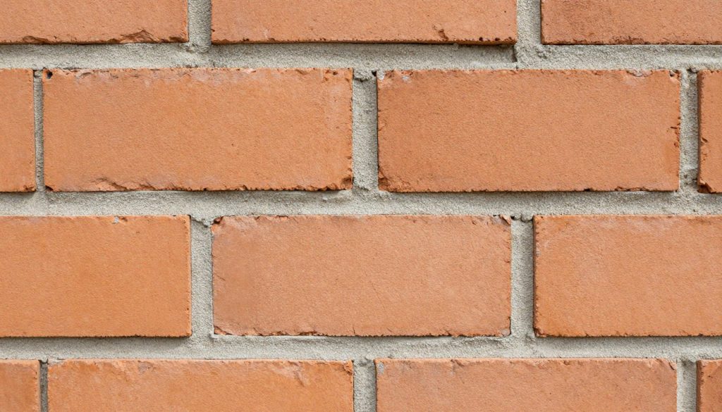 Detailaufnahme Mauerwerk mit sauber gezogenen Fugen
